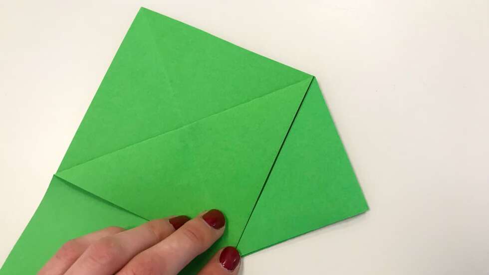 Gefaltetes grünes Papier