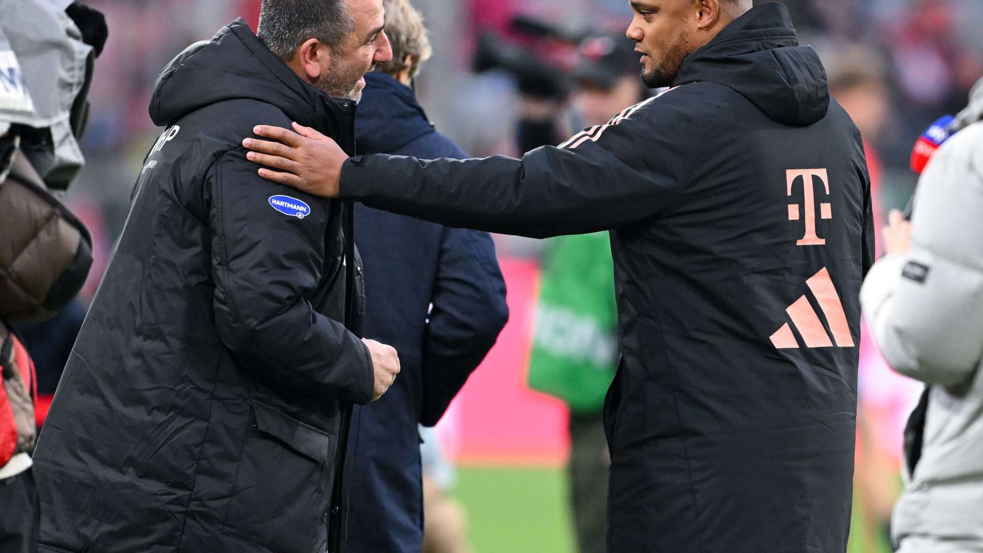 Frank Schmidt (l) und Vincent Kompany