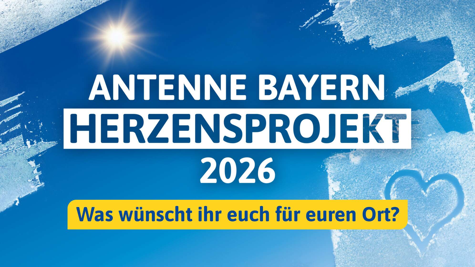 Ein Hintergrund aus blauem Himmel mit dem Effekt von frisch freigekratzten Scheiben am Rand des Bilds, dazu der Text: ANTENNE BAYERN Herzensprojekt 2026: Was wünscht ihr euch für euren Ort?