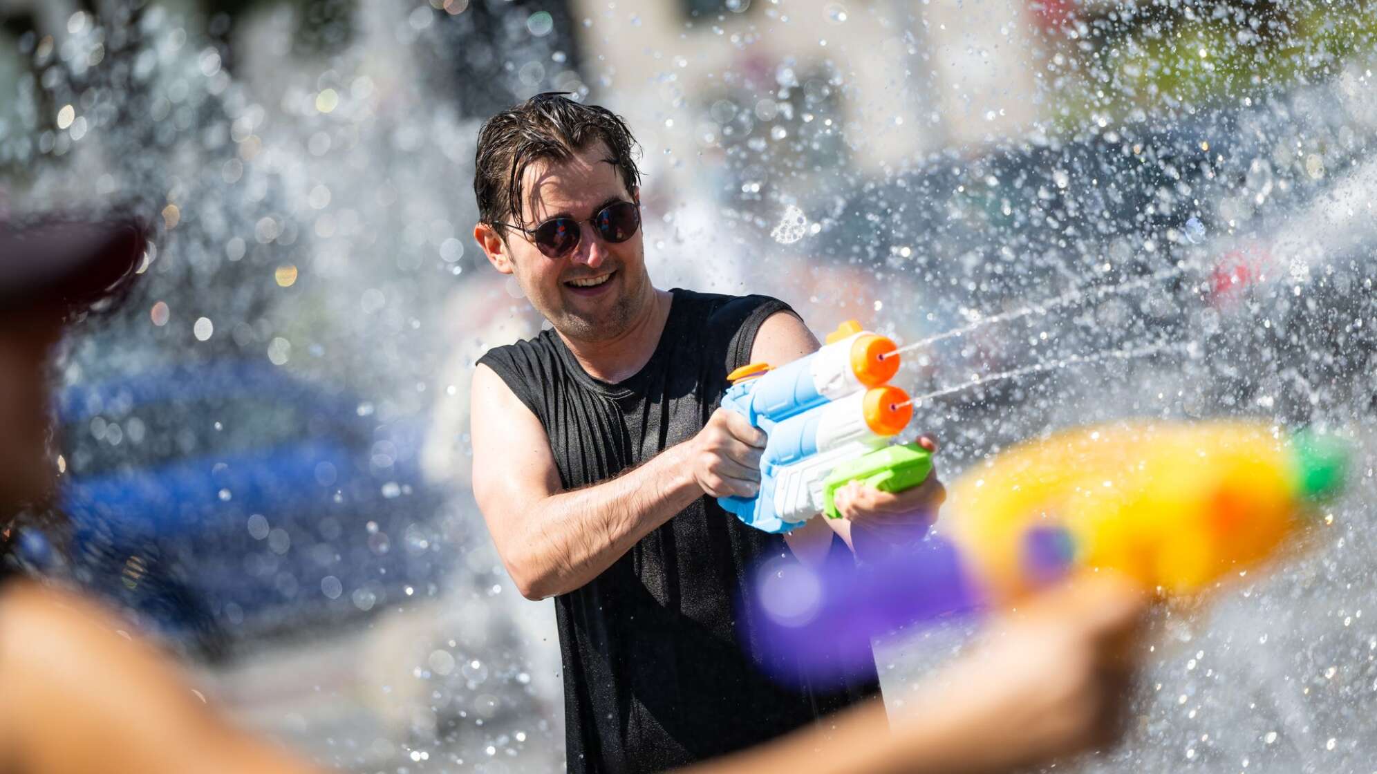 Wasserschlacht als Demonstration für mehr Klimaschutz