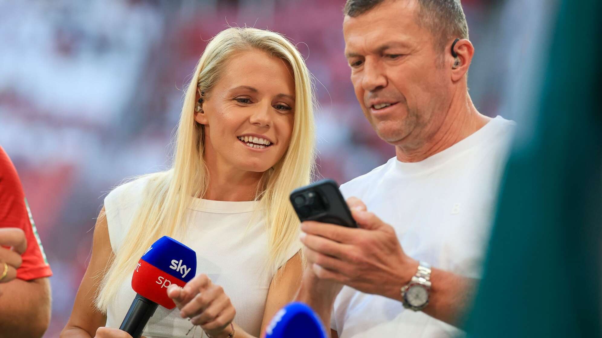 Julia Simic und Lothar Matthäus (r)